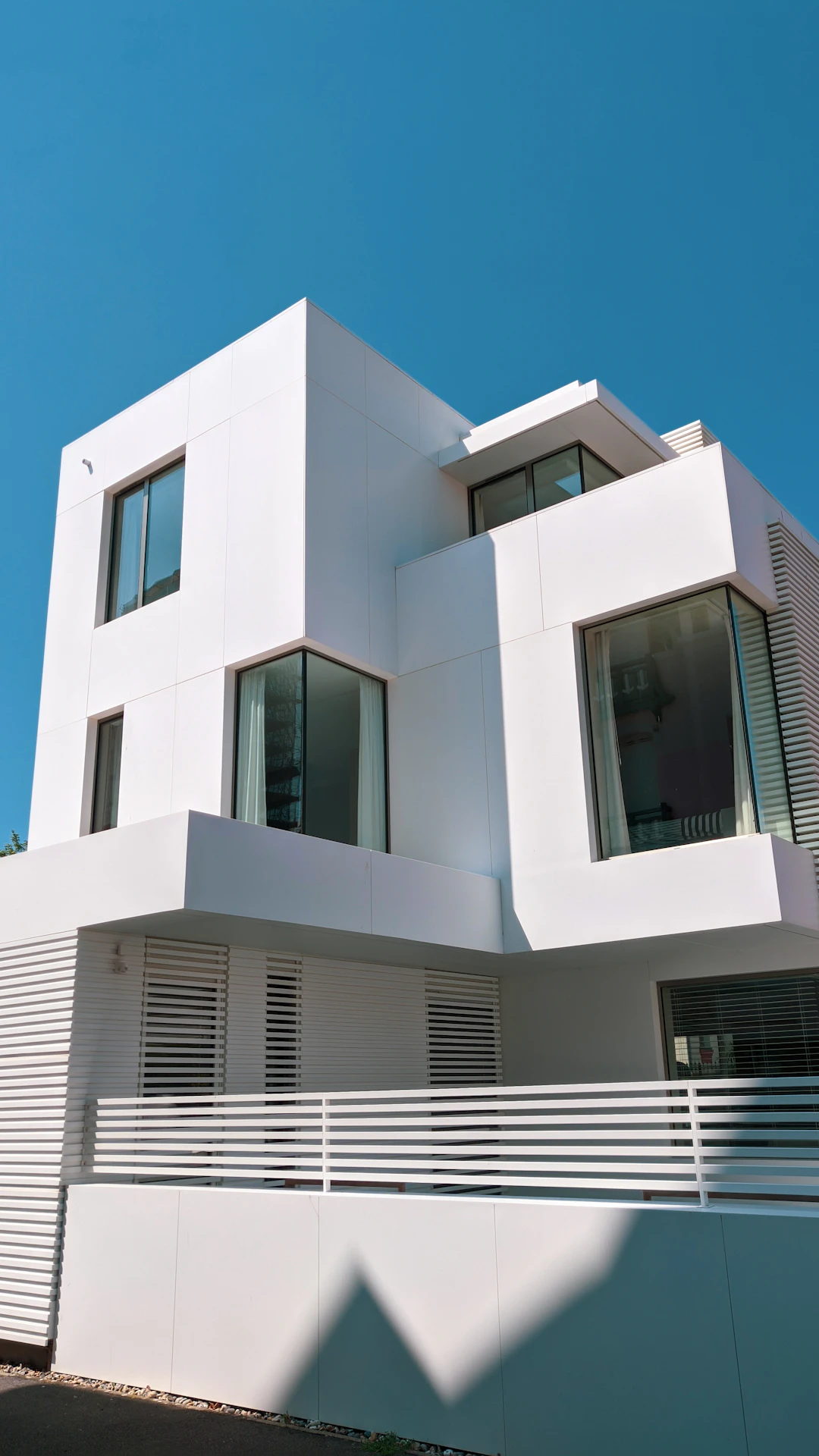 white concrete building under blue sky during daytime