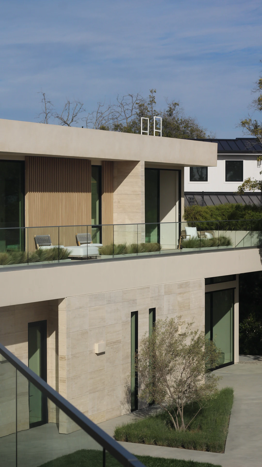 a modern house with a balcony and balconies
