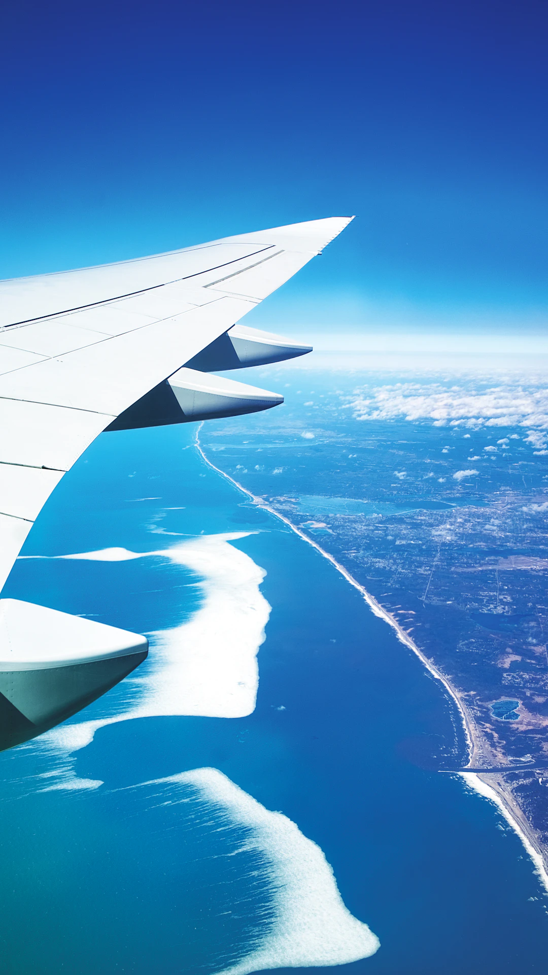 aerial photo of airplane wings during daytime