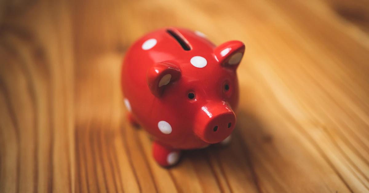 pink and black ceramic piggy bank